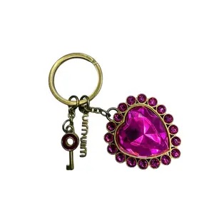Pre-owned Miu Miu heart shaped crystal keychain and bag charm