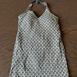 Sequence Chikankari Short Kurtha in Gray Color Sleeveless with Unique Design Pattern