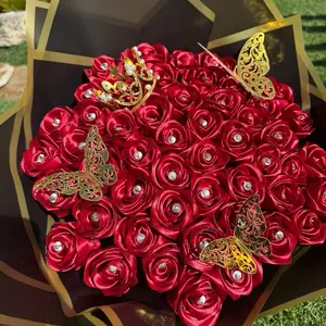 Eternal Flowers Red Rose Bouquet with Gold Butterfly Decorations and Sparkling Accents