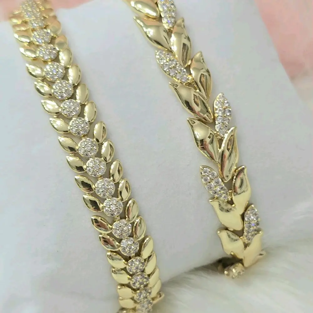 Pulseras de ramitas doradas medida 10mm x 7.5inch .Laminado de alta calidad
