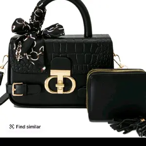 Elegant Black Crocodile-Embossed Handbag with Gold Hardware and Matching Wallet Set