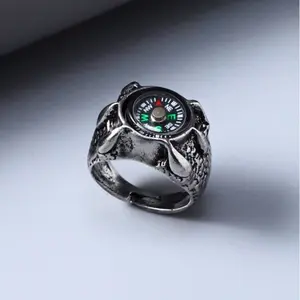 A metal ring combined with a magnified compass for men, perfect jewelry for mountain climbing