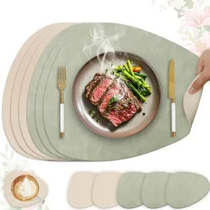 4/6-piece set of cowhide-pattern PU placemats (4/6 placemats + 4/6 coasters), non-slip, double-sided. Teardrop-shaped faux cowhide leather placemats, Kitchen Decorative Placemat, suitable for home kitchens and office desk mats Kitchenware