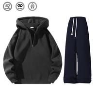 Black top + blue trousers