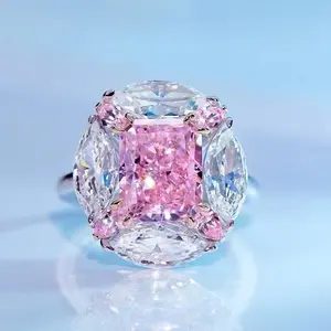 pink A luxurious hand polished Moissanite ring paired with pink zircon. Exquisite craftsmanship. Sparkling Moissanite and pink zircon. Master level aesthetic design. Excellent quality. Brilliant and radiant. High quality hand polished. Unmatched talent.