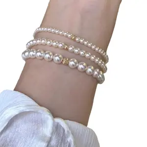 Denise's new round pearl bracelet is a high-end beaded fashion accessory for women, featuring a unique, elegant, French-inspired elastic bracelet