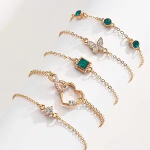 5PCS Heart Crystal Bracelet Set for Women, Green Stone Butterfly Rhinestone Jewelry with Gold Tone Finish, Stylish Winter Fashion Wrist Accessories