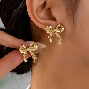 Gold Bow Earrings. Cute Bow Stud Earrings. Fashion Earrings. Gold Jewelry.