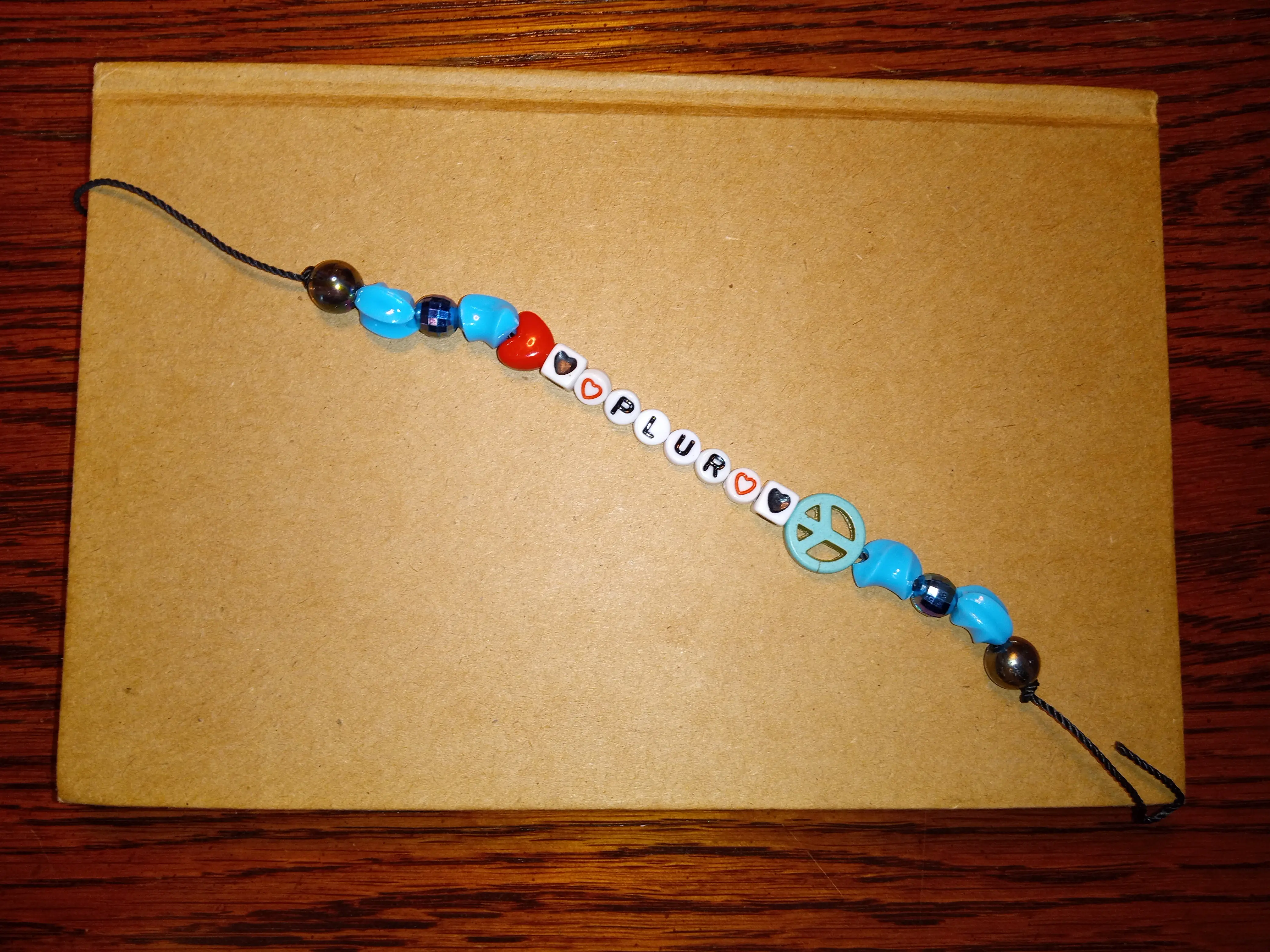 PLUR bracelet, plastic beads, ULTRA, Coachella, rave, music festival