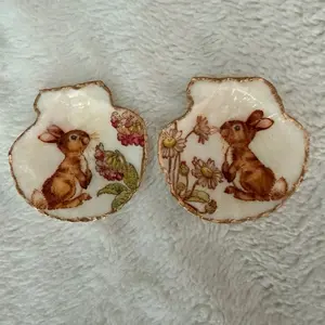 Handmade Bunnies decoupaged on a small Clam Shell. 1 for $7 or 2 for $10. An Artistic Decorative Piece for Easter baskets or decor.