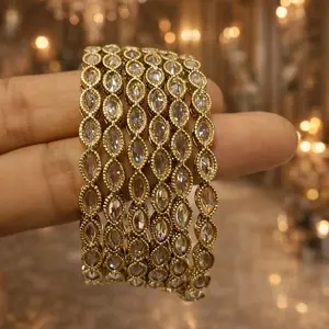 Antique Gold Polki Bangles Set of 6 with Intricate Design and Sparkling Stones for Festive Wear