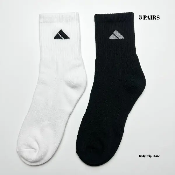 5 pairs of black and white patterned mid length socks