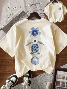 Sea Turtle Flower Shell Graphic Tee for Women Men, Vintage Coastal Beach Ocean Animal Print T-Shirt, Casual Short Sleeve Crewneck Tops, Casual Loose Fit, Vacation, Beach Trips, Daily Wear, Gift for Turtle Lovers, Ocean Enthusiasts