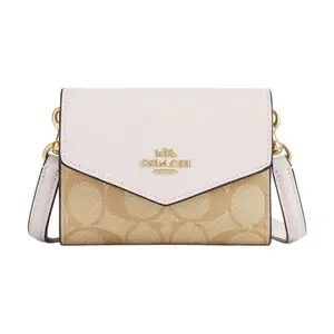 COACH Envelope 12 Mini Crossbody Bag for Women – Classic Monogram Canvas and Leather in Gold and Light Khaki Chalk