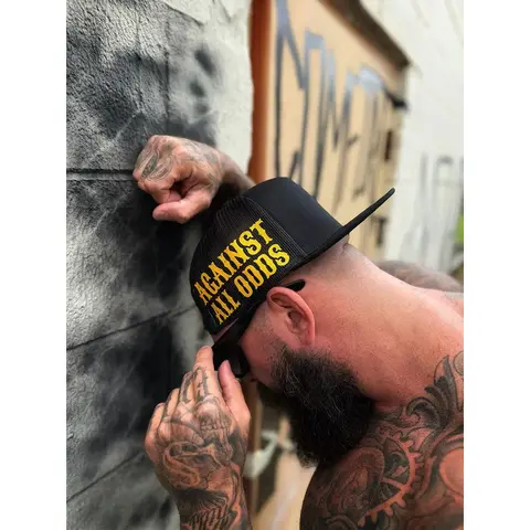 Against All Odds Side-Style Cotton Snapback Black Cap - Flat Bill, Unisex 1 Size Fits All, Adjustable Text Slogan Graphic, Streetwear Baseball Cap, Stylish Hat, Street Fashion Casual Accessory