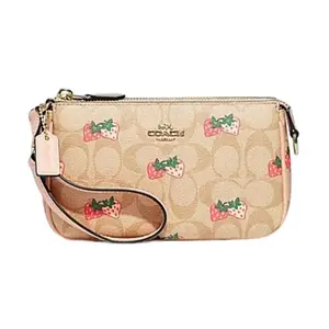 Coach Nolita 19 Strawberry Print Coated Canvas and Leather Crossbody Bag for Women in Beige and Pink