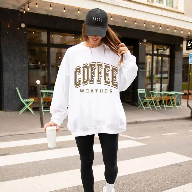 “Coffee Weather” sweatshirt, a cute oversized trendy sweater for coffee lovers, perfect for cozy days and anyone who enjoys stylish, warm caffeine-themed apparel.
