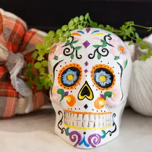 Dia De Los Muertos Decorative Ceramic Skull Hand Painted with Floral & Swirl Patterns for Day of the Dead Halloween Home Decor Glossy 5.375"H x 5"W x 7.125"D - Ornaments