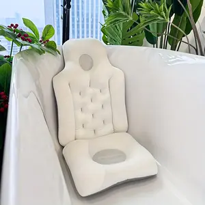 Soft, breathable and ergonomic cushion for sitting and lying. Suitable for home or hotel use, made of polyester blend fabric in light beige with a user-friendly design. Features a contoured headrest and armrest support.