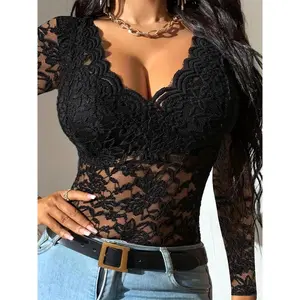 A ladies' black lace blouse with netting and a short sleeve design, resembling a "ladie" style.