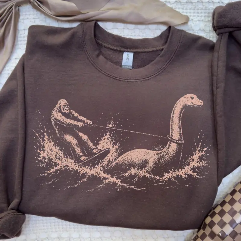 Funny Bigfoot Loch Ness Monster Sweatshirt, Cryptid Waterskiing Sweater, Summer Sasquatch Gift