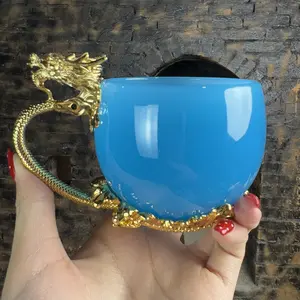 Handmade jade glass master cup with inlaid golden dragon handle