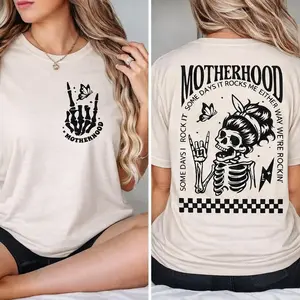 Rockin Motherhood Skeleton Messy Bun Graphic T-shirt, Edgy Mom Quote Apparel For Women, Cozy Printed Design Mother's Day Gift Idea | 010426.C00826.ID03