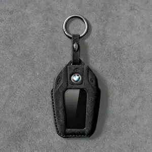for BMW, including 1 Series, 3 Series, 5 Series, 7 Series, X1, X3, and X5. 2026 new Alcantara car key fob in charcoal black.