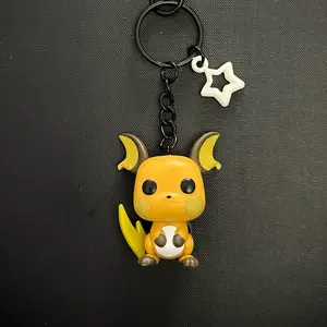 Raichu Keychain with Clip - Orange Design, Keyring Attachment, Character Characteristics
