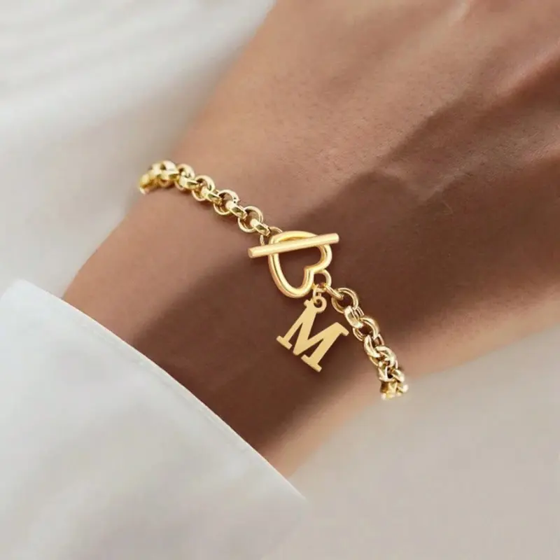 Gold Heart-Through Bracelet M