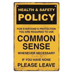 Humorous Health and Safety Policy Metal Sign with Common Sense Reminder Vintage Yellow and Black Ideal for Bar Workshop or Garage Wall Decor Durable Iron Construction Perfect for Room Decoration