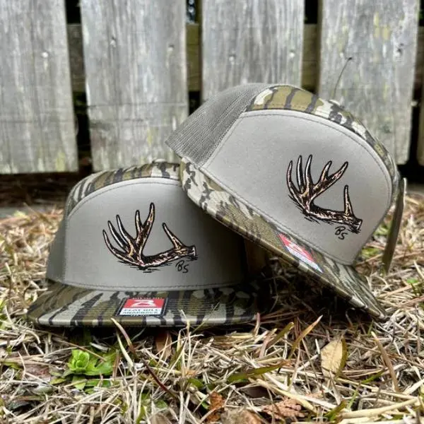 Antler Shed 7 Panel Hat – Mossy Oak Bottomland Camo Snapback Cap | Structured Outdoor Hunting Hat | Adjustable Performance Hat for Hunting, Fishing & Everyday Wear