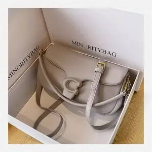 MINORITYBAG Stylish Gray Leather Crossbody Bag with Adjustable Strap and Gold Hardware for Everyday Use