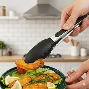Stainless Steel Barbecue Tongs with Heat-Resistant Silicone Tips. Non-Slip, Curved Grip for Easy Cooking, Flipping, and Serving. Multipurpose Kitchen Tool for Grilling, Frying, and Handling Hot Food. Durable & Ergonomic Cooking Essential.