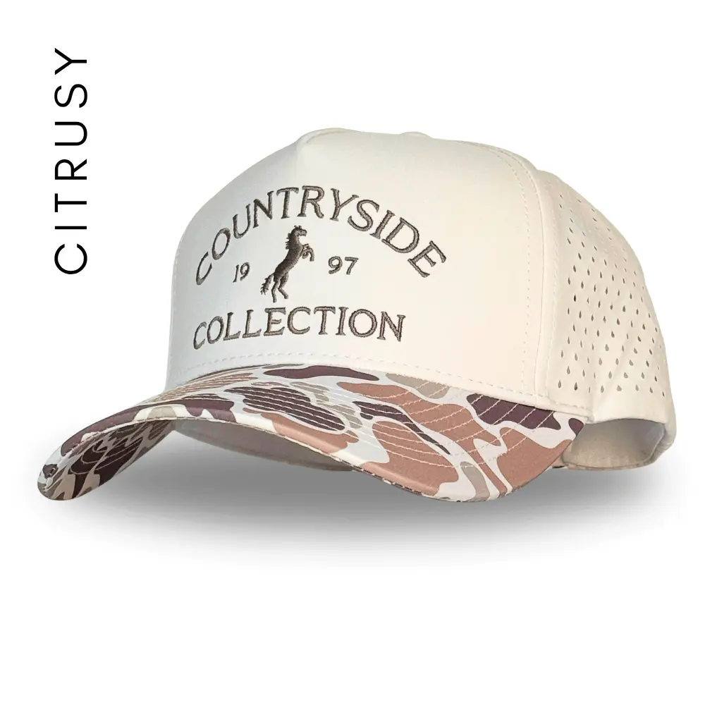 COUNTRYSIDE COLLECTION TRUCKER HAT - DUCK CAMO