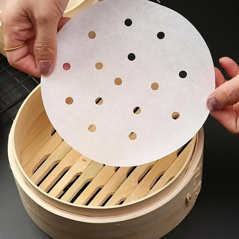 100pcs Food Grade Disposable Steamer Paper, Air Fryer Parchment Paper Air Fryer Liner/Bamboo Steamer Liners/Perforated Parchment Paper for Air Fryer Steaming Basket, Bakeware and More