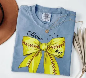 [Custom] Softball Number Comfort Colors Shirt, Softball Bow Tee, Personalized Softball Player Shirt, Softball Fan Gift, Sports Mom, Game Day