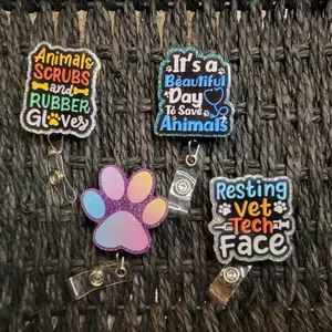 Veterinary retractable badge reel