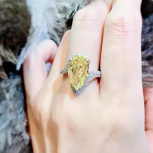 yellow A luxurious hand polished Moissanite ring paired with yellow zircon. Exquisite craftsmanship.Sparkling Moissanite and yellow zircon. Master level aesthetic design. Excellent quality. Brilliant and radiant. High quality hand polished.