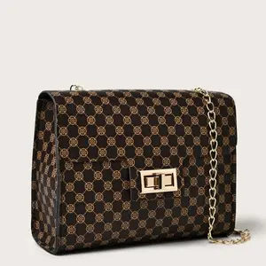 Elegant Black & Gold Patterned Crossbody Bag with Chain Strap and Secure Buckle Closure