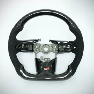 Carbon fiber steering wheel with suede sports grip