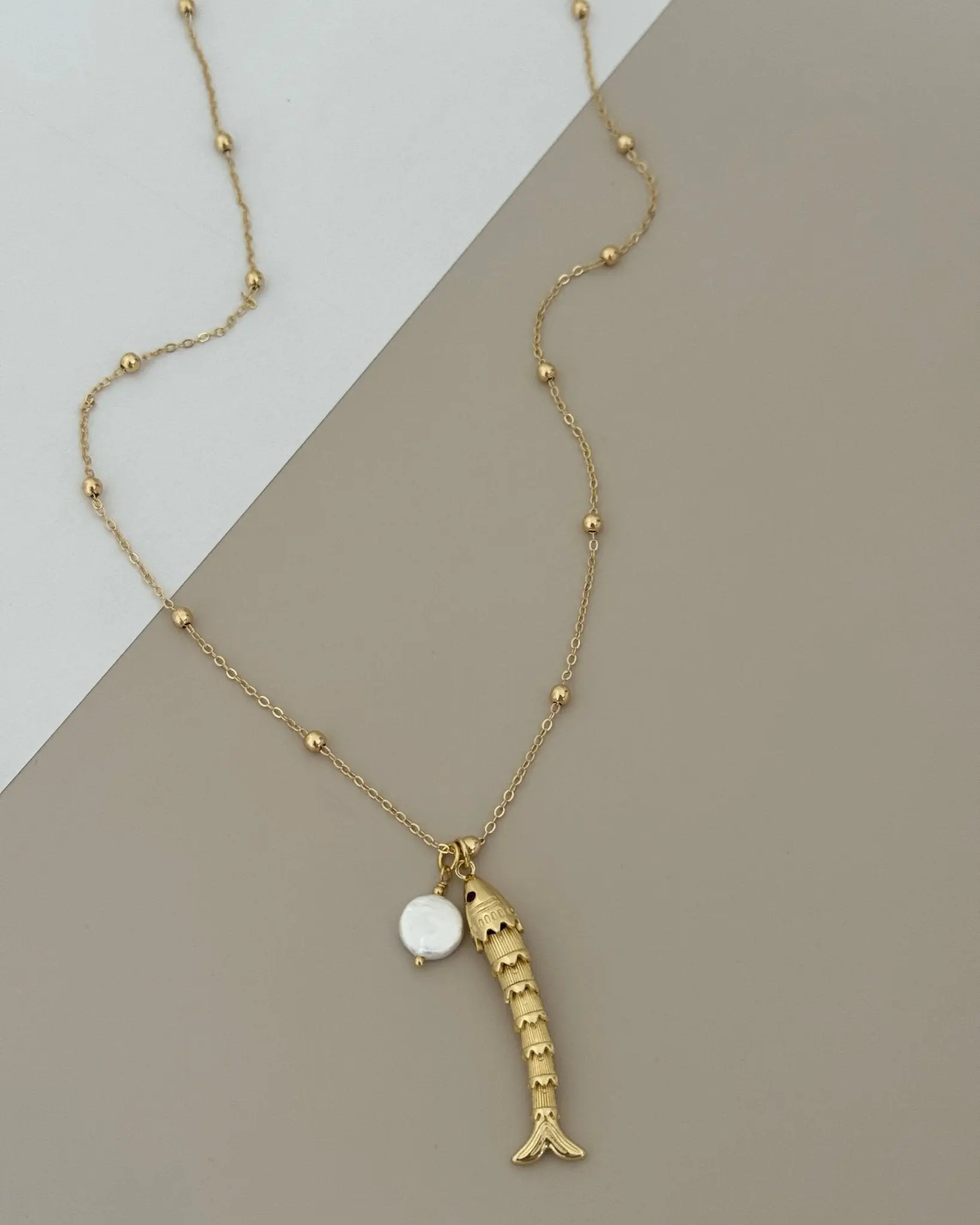 Gold Necklace with Articulated Fish Pendant