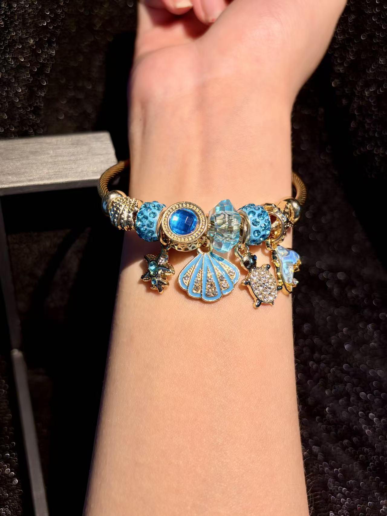 Ocean Theme Open Cuff Bangle, Shiny Golden Bracelet With Blue Crystal Beads, Shell, Turtle & Mermaid Tail Charms, Summer Beach Jewelry Gift For Women