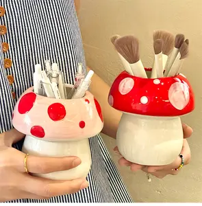 Mushrooms have grown on your table! Cute ceramic mushroom-shaped decorative items for organizing makeup brushes, pencil holders, and pen holders - a creative piece for your desk.