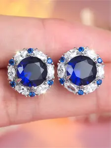 A pair of elegant retro-style women's earrings, inlaid with blue synthetic zircon, suitable for wearing at parties, banquets and weddings