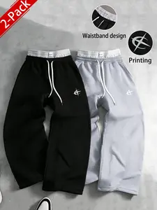 Unisex Y2K street-style cool pants—original long trousers featuring a casual double waistband faux two-piece design, star print, loose straight fit, and drawstring. Soft, comfortable athletic pants that are perfect for everyday fashion styling and streetw