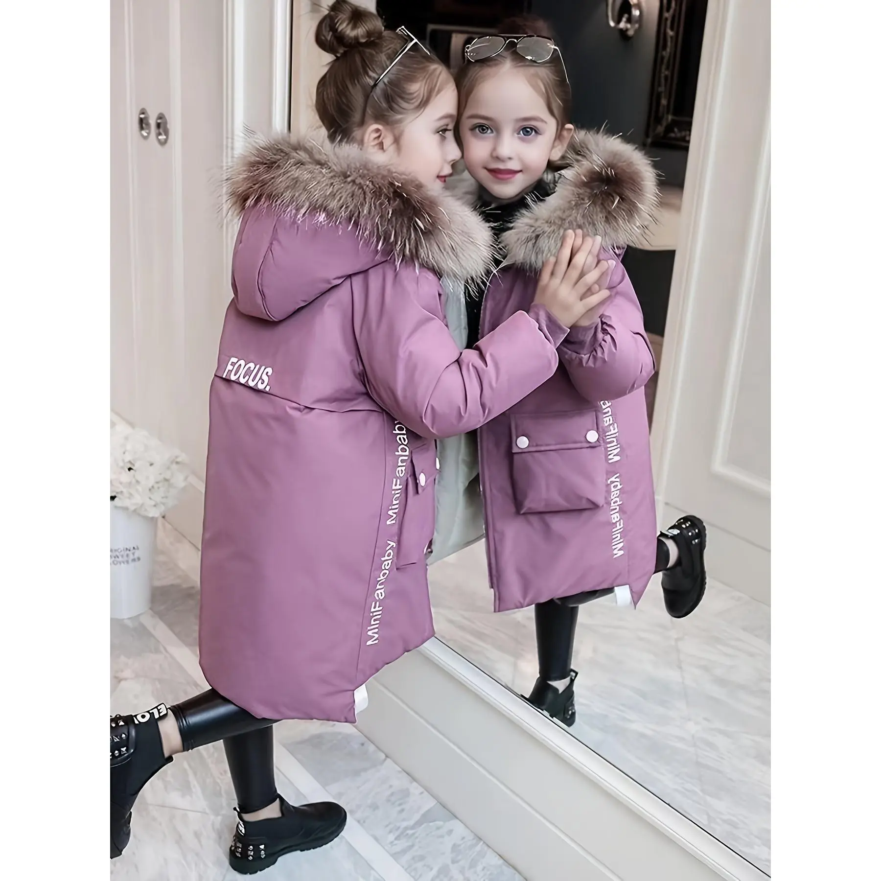Stylish Girls' Winter Parka Jacket with a Hood, Designed for Outdoor Activities And Cold, Snowy Conditions