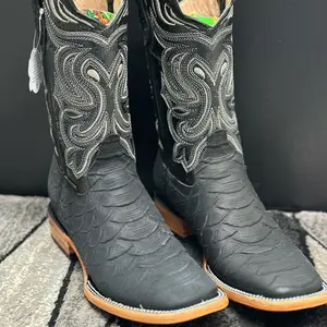 Python style boot with leather sole