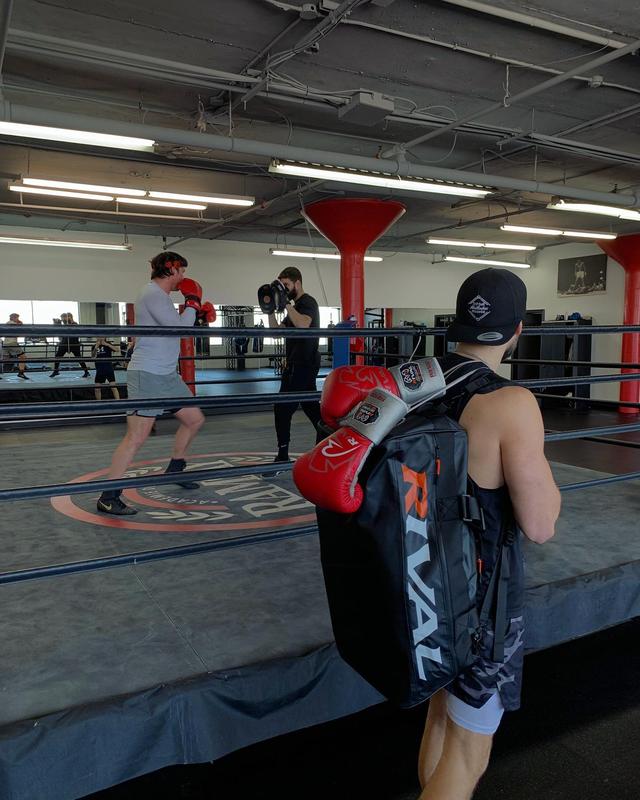 RIVAL Boxing RS100 Pro Lace-Up Sparring Gloves, Ergonomic True Fist Construction