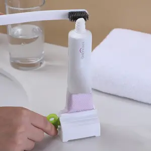 Toothpaste Squeezer Tooth Paste Holder Oral Care Bathroom Tools Tube Cosmetics Press Facial Cleanser Rolling Squeezing Dispenser